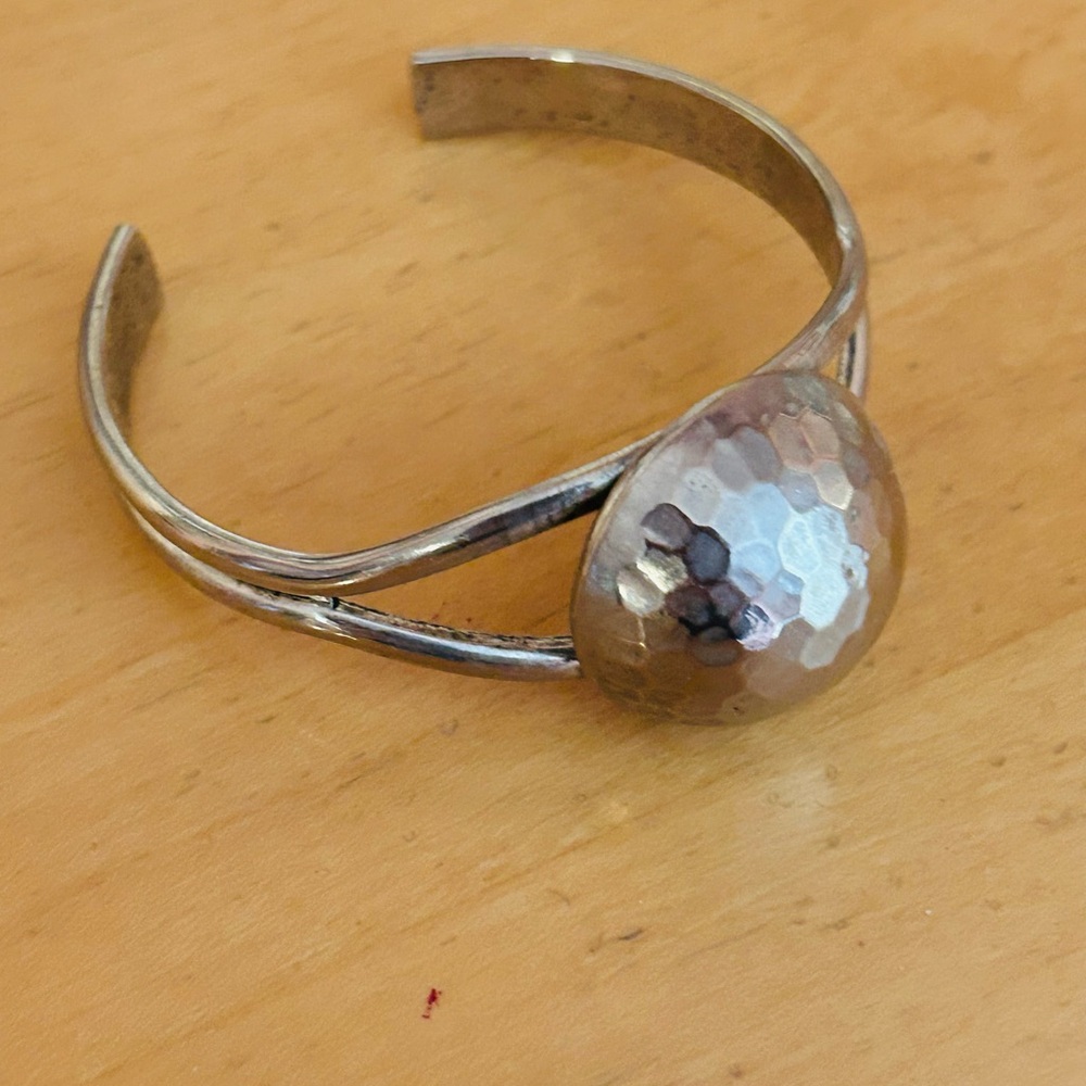 Silver Cuff Bracelet with Hammered Center and Open Design